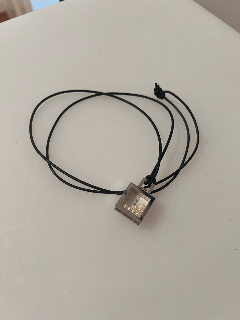 Mikimoto Black Cord Necklace with Silver Square Pearl Clock Pendant